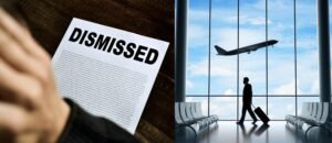 Employee dismissal letter alongside an airport terminal, illustrating the importance of exploring alternatives to dismissal before terminating employment due to sickness absence.