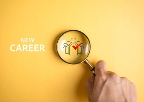 Magnifying glass highlighting a selected candidate with the words New Career on a yellow background